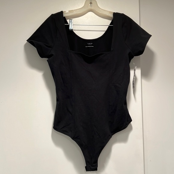 Urban Outfitters Tops - NWT. Urban Outfitters out from under black thong body suit.